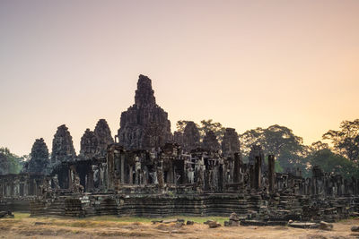 Bayon temple ruins at sunrise, siem reap, cambodia