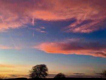 Scenic view of dramatic sky during sunset