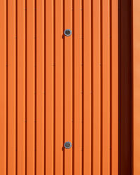 Full frame shot of an orange wall