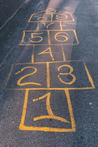 High angle view of hopscotch drawing on road