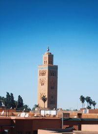 Low angle view of built structure against clear blue sky