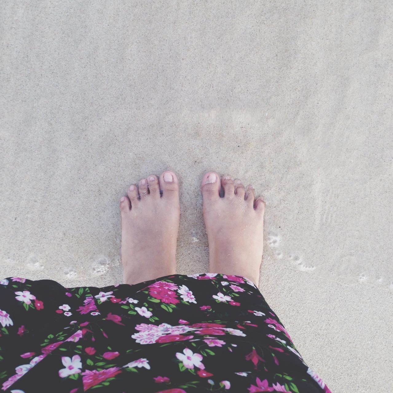 low section, person, personal perspective, wall - building feature, high angle view, human foot, pink color, standing, lifestyles, part of, red, indoors, close-up, day, barefoot, pattern