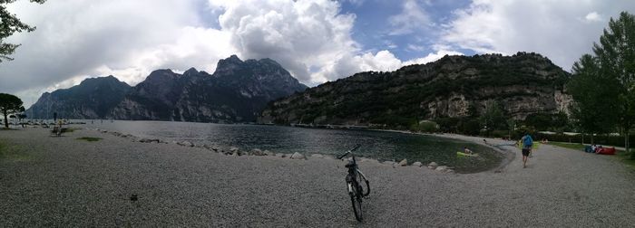 Panoramic view of land and mountains against sky