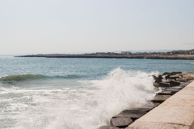 Scenic view of sea against clear sky