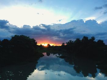 Scenic view of silhouette trees against sky during sunset