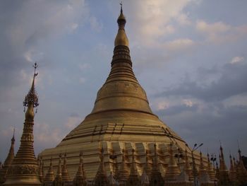 Temple against cloudy sky