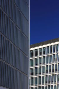 Low angle view of skyscraper against clear sky