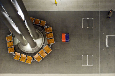 High angle view of man playing on floor in building