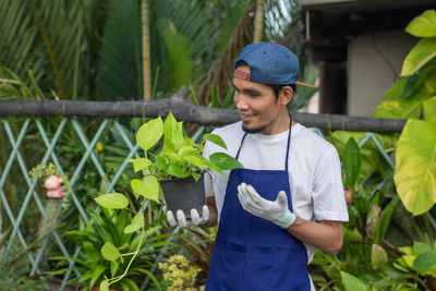 Young man standing outdoors