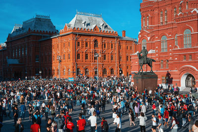 Group of people in front of building
