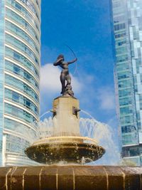 Low angle view of fountain statue