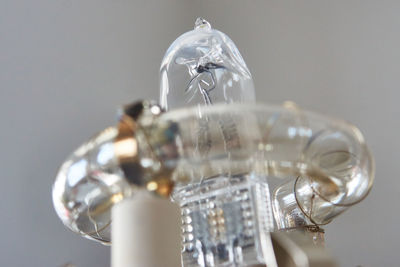 Close-up of light painting on table against gray background