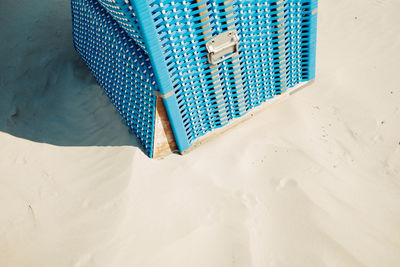 High angle view of empty beach chair