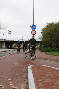 Bicycle on road against sky