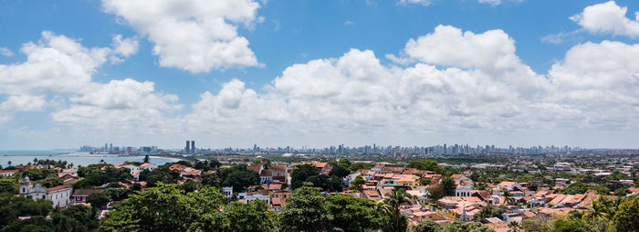 Panoramic view of town against sky