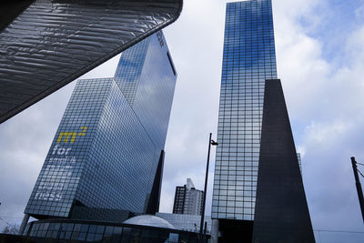 Low angle view of modern buildings against sky