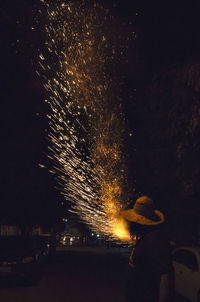 Firework display at night