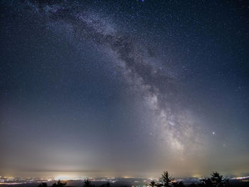 Low angle view of stars in sky at night