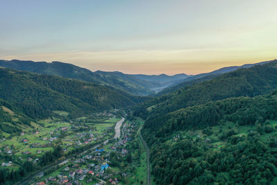 Scenic view of landscape against sky during sunset