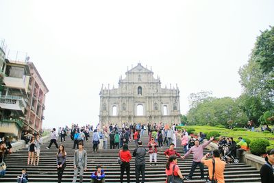 Group of people in front of building