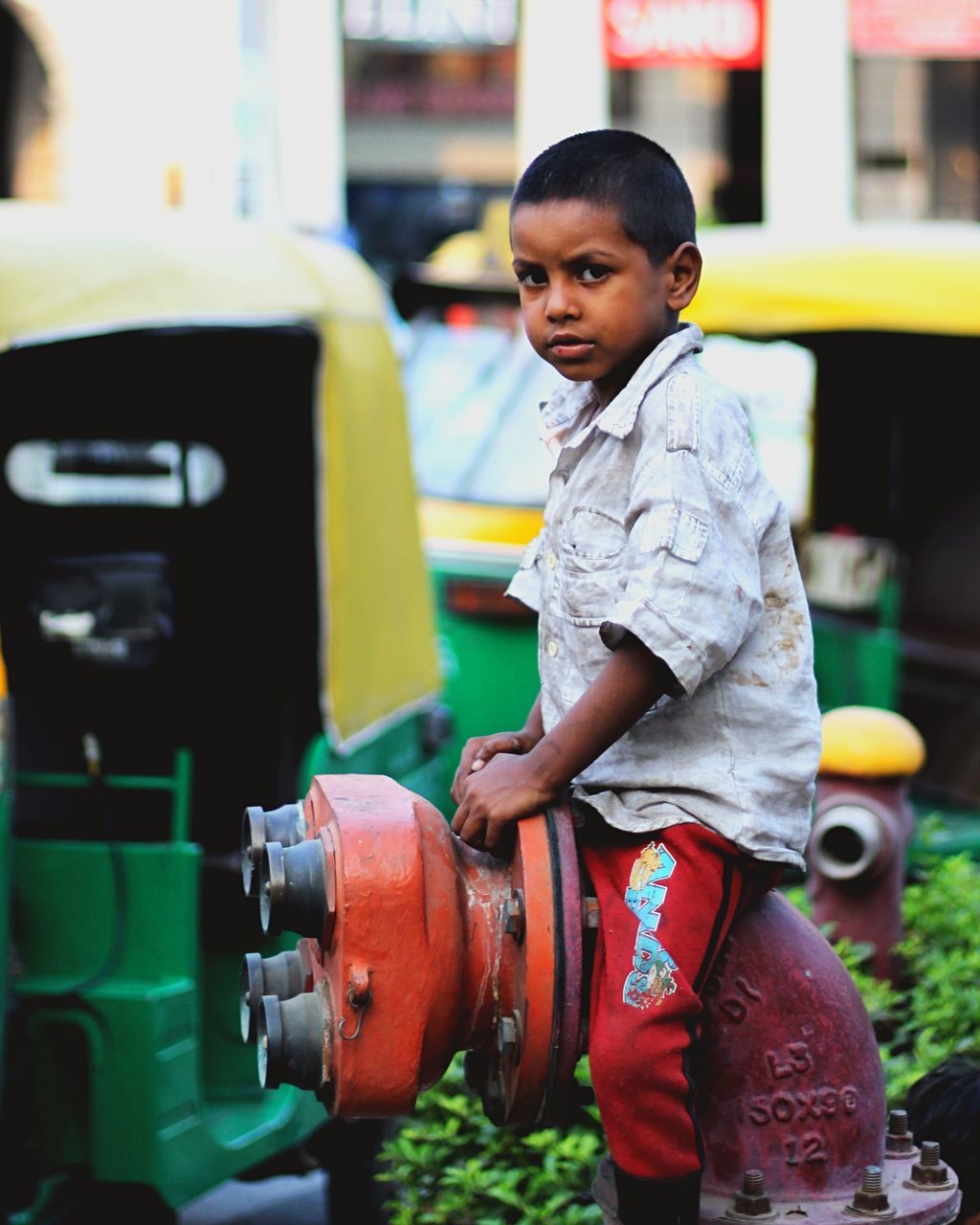 SIDE VIEW OF A BOY STANDING