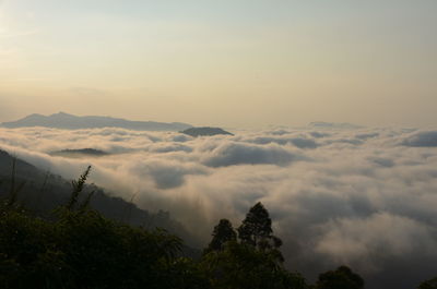 Low angle view of mountains against sky at sunset