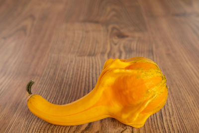 High angle view of yellow leaf on table