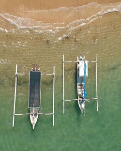 High angle view of people in boat on lake