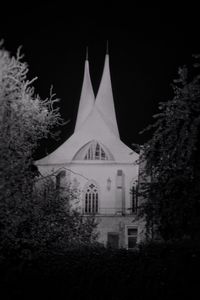 Cathedral against sky at night