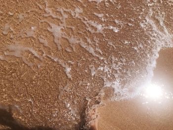 Close-up of sand on beach