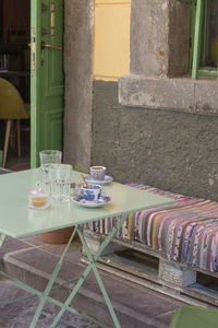 Chairs and tables at sidewalk cafe