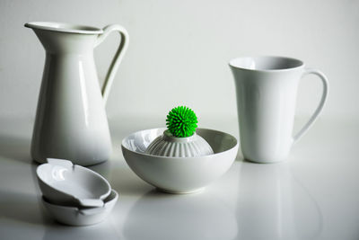 Close-up of coffee cup on table