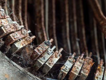 Close-up of rusty machine part of typewriter