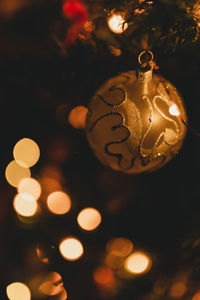 Close-up of illuminated christmas tree at night