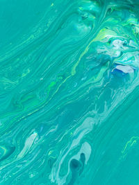 Abstract art background in green and blue neon tones