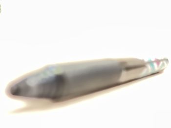 Close-up of pen against white background