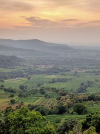 Scenic view of landscape against sky during sunset