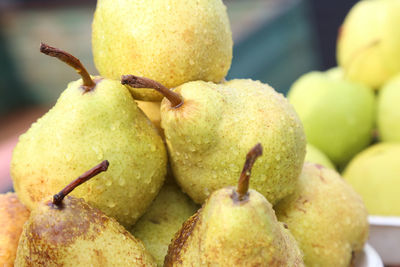 Pears on the local farm market, eco fruits, juicy products. shopping organic products. 