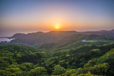 Scenic view of mountains against sky during sunset