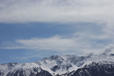 Idyllic shot of snowcapped mountains against sky