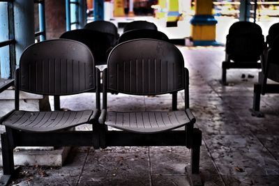 Empty chairs in city