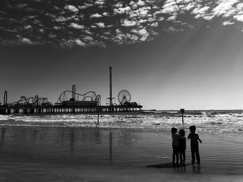 Woman standing on beach