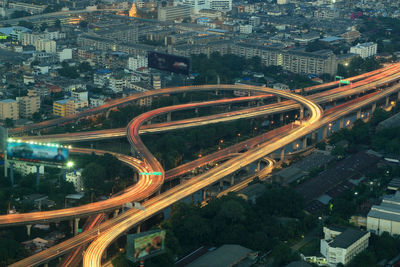 High angle view of illuminated cityscape at night