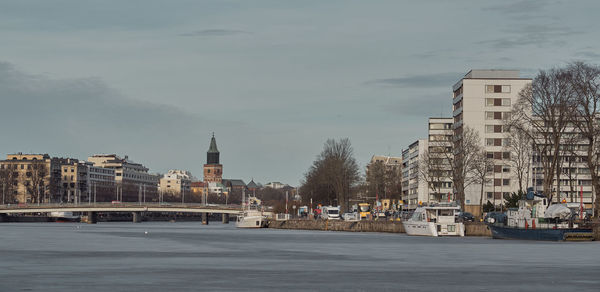 A panorama of the city overlooks the aura river with the cathedral in the background.