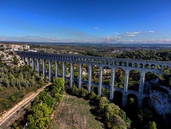 Panoramic shot of landscape against blue sky