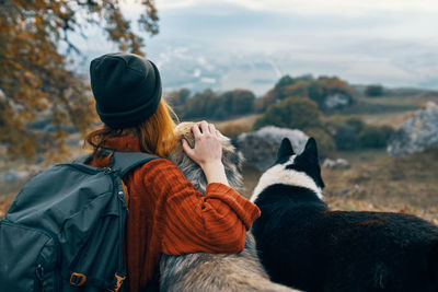 Rear view of woman looking at winter