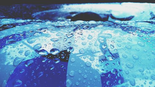 Low angle view of water against blue sky