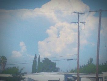 View of road against cloudy sky