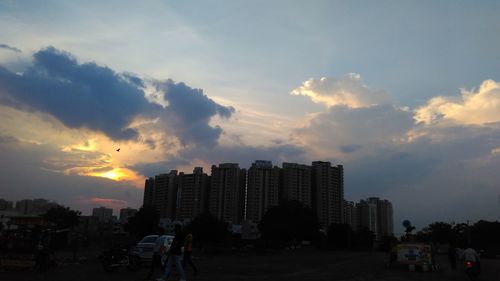 Panoramic view of buildings against sky during sunset