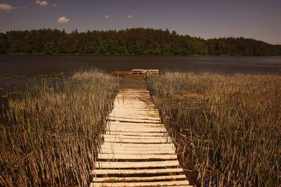 Jetty at calm lake